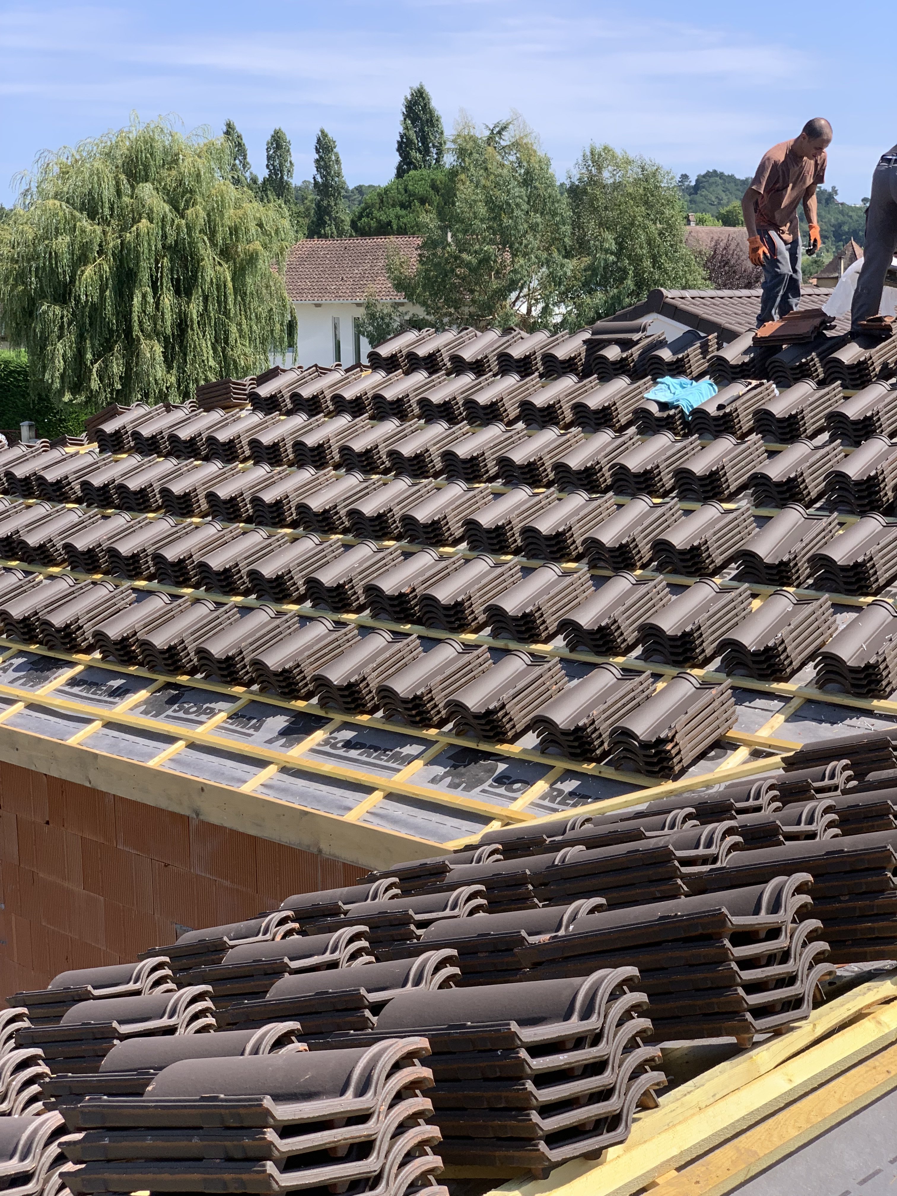 Pose tuiles ardoise toiture Bergerac
